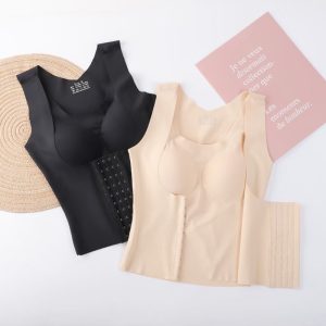 Two shapewear tops, one black and one beige, displayed side by side on a flat surface.