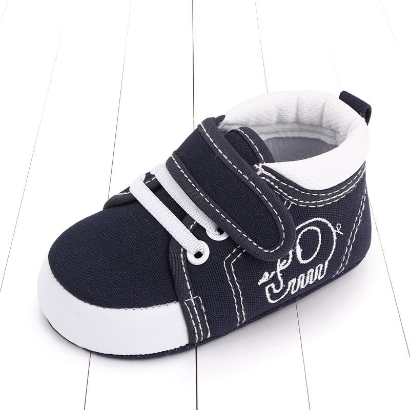 Cozy Baby Toddler Shoes: Ultimate Comfort & Safety for Your Little One 1 Black And White Baby Sneaker With Velcro Strap, Suitable For Infant Wear, Featuring Comfortable Fabric And Stylish Design. Perfect For Toddler Footwear Needs On Syndmart.