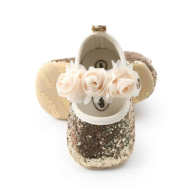 Happy Feet Toddler Baby Shoes - Comfortable and Stylish Pick for Your Little One! 2 Shiny Gold Glitter Baby Shoes With White Fake Flower Decoration, Perfect For Special Occasions And Gifting, From Syndmart'S Collection.