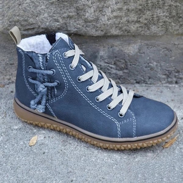 Stay Chic & Warm: Women's Flat Heel Snow Boots - Defeat Winter in Style! 5 Comfortable Blue Leather Sneaker From Syndmart With White Laces And Rugged Rubber Sole, Perfect For Casual And Everyday Wear. Features Durable Construction And Stylish Design.
