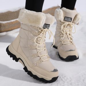 Warm winter beige snow boots with faux fur lining and rugged black soles for outdoor snow activities. Perfect for cold weather and winter adventures.