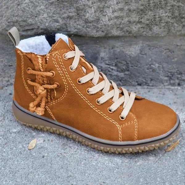 Stay Chic & Warm: Women's Flat Heel Snow Boots - Defeat Winter in Style! 1 Brown Leather High-Top Sneaker With White Laces And Cozy Lining, Perfect For Casual Wear And Outdoor Activities. Durable Sole Provides Comfort And Style For Everyday Use.