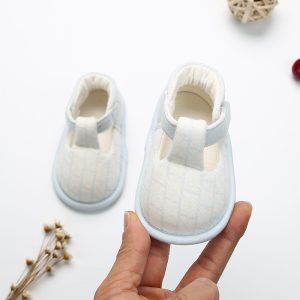Soft baby shoes with durable fabric, slip-on design, and comfortable lining for infants. Perfect for newborns and early walkers, offering lightweight support and cute style.