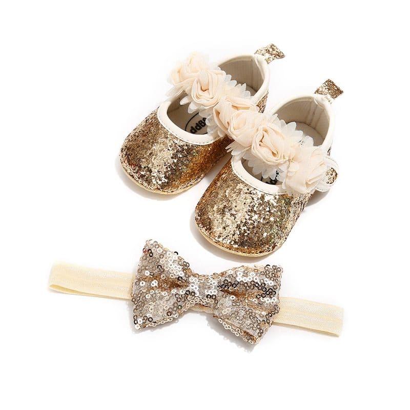 Happy Feet Toddler Baby Shoes - Comfortable and Stylish Pick for Your Little One! 1 Glittery Baby Shoes With Flower Embellishments And A Sequined Bow Tie Accessory, Perfect For Special Occasions Or Baby Photoshoots.