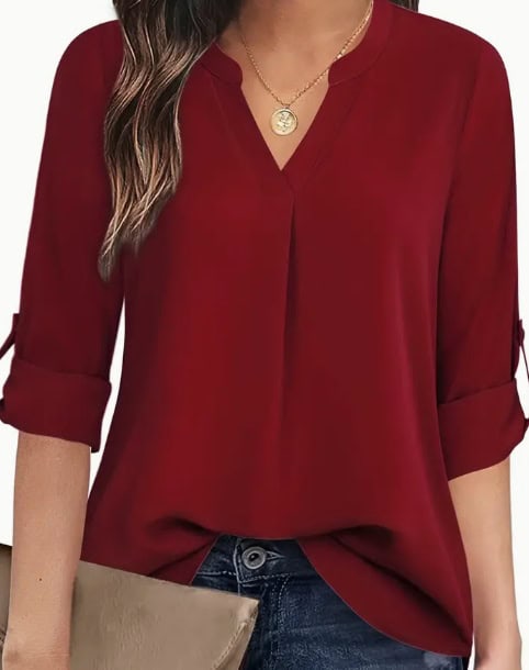 Chic V-Neck Blouse: Relaxed Fit, Long Sleeve Fashion for Women 3 Burgundy Blouse With A V-Neck And Rolled Sleeves Worn By A Model.