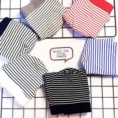 Comfort Plus: Mid-Back Boxers - All-Day Support for Ultimate Comfort 1 Collection Of Striped Fabric Swatches In Various Colors Arranged On A Grid Background.