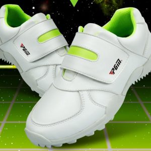 White athletic shoes with green accents and Velcro straps for kids, digital background, sports footwear, comfortable sneakers for children, trendy and supportive footwear, Syndmart athletic shoes for kids.