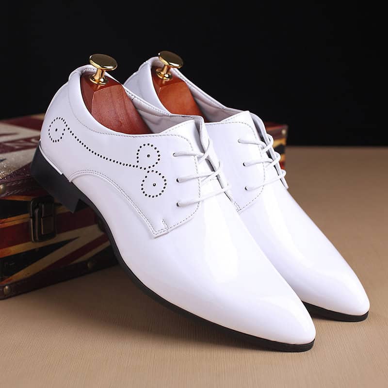Elegance Defined: Men's Classic Black Leather Slip-On Dress Shoes 5 Elegant White Men'S Dress Shoes With Perforated Design, Sleek Pointed Toe, And Wooden Shoe Trees Inside For Maintaining Shape, Perfect For Formal Occasions And Professional Attire.