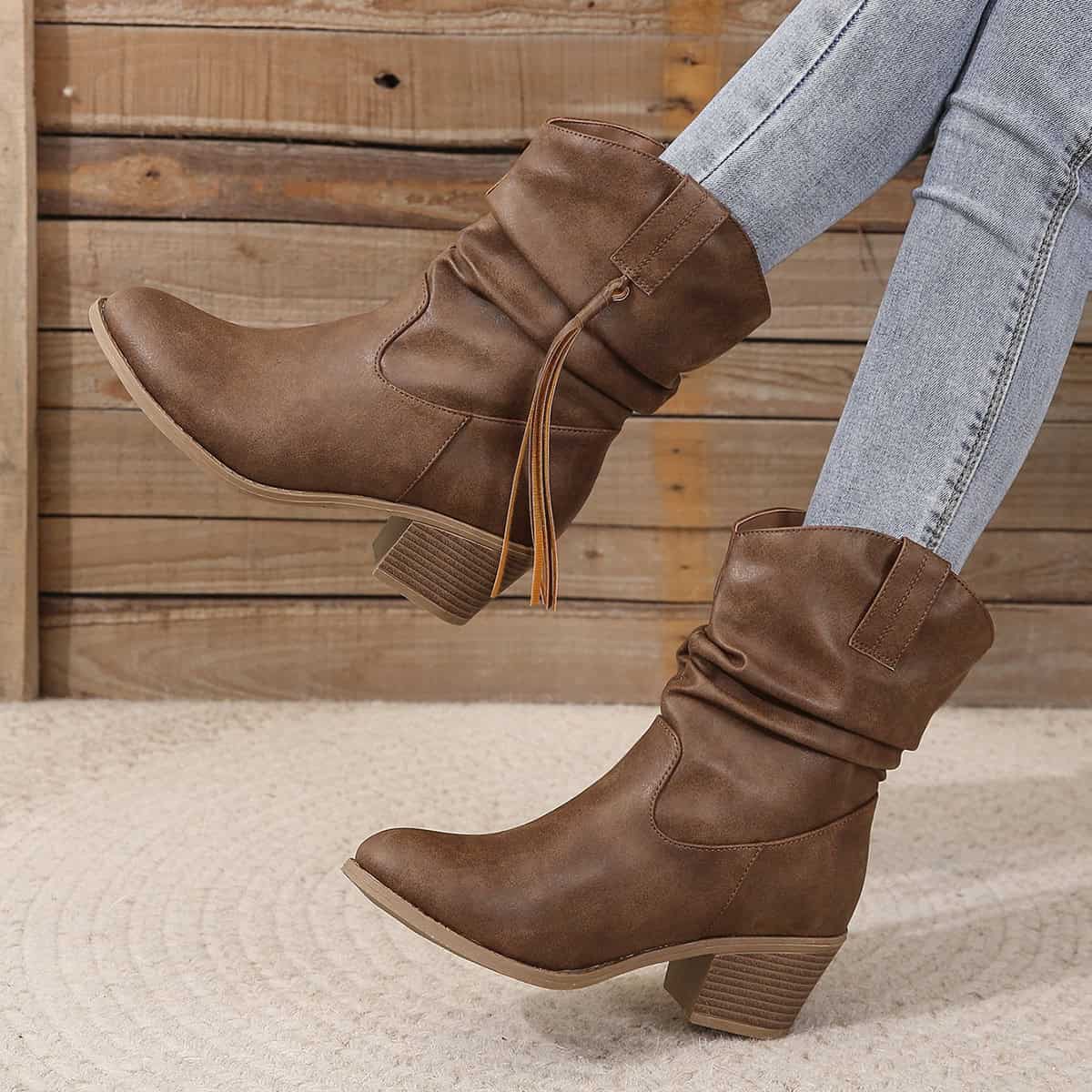 Vintage Western Tassel Mid-Calf Boots - Winter Chic Appeal 6 Comfy Brown Ankle Boots With Chunky Heels, Stylish For Fall Fashion, Paired With Light-Wash Jeans For Casual Chic Footwear Options.