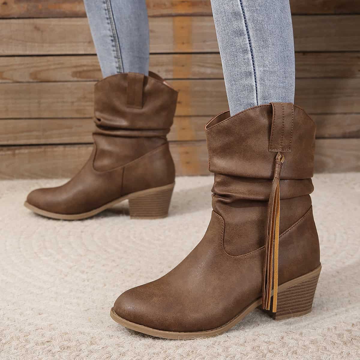 Vintage Western Tassel Mid-Calf Boots - Winter Chic Appeal 1 Chunky Brown Winter Boots With A Wide Cuff, Side Zipper Detail, And Stacked Heel, Perfect For Fall And Winter Fashion. Made From High-Quality Leather For Style And Comfort.
