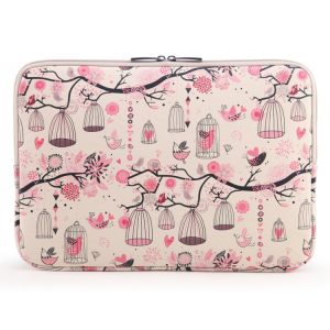 Laptop sleeve featuring a pattern of birdcages, flowers, and birds in pink and black on a cream background.