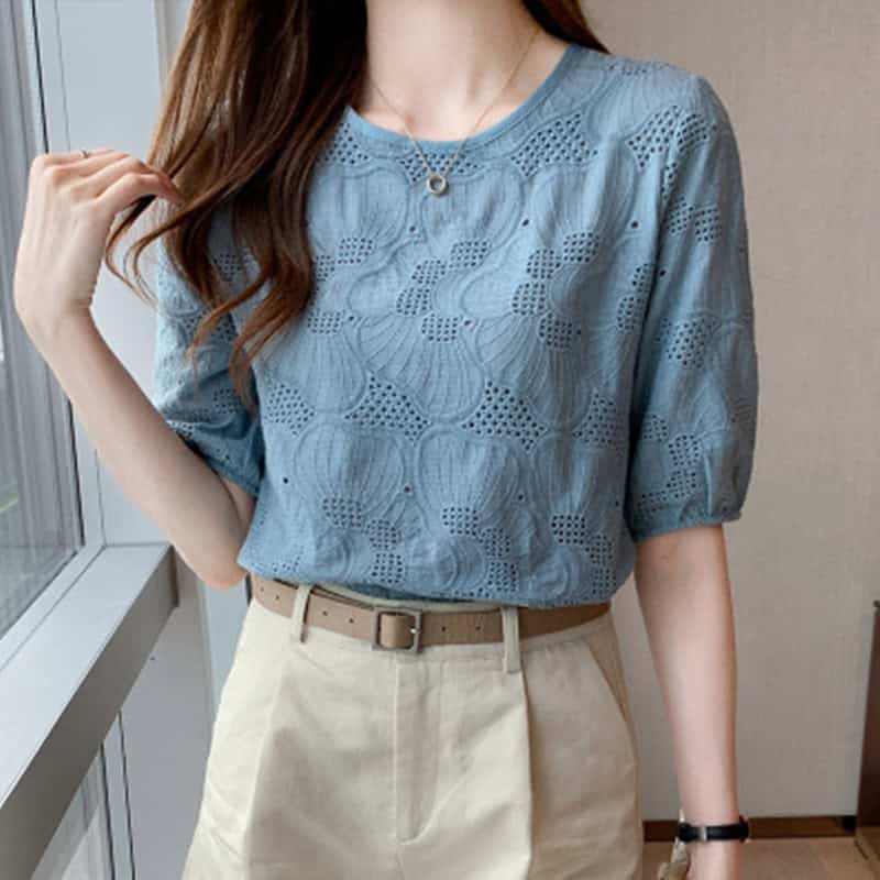 Fashion-forward: Women's Chic Embroidered Chiffon Shirt - Stylish & Breathable 1 Woman Wearing A Light Blue Lace Top With A Round Neckline And Puffed Sleeves.
