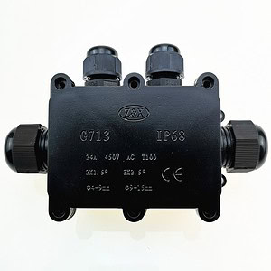 24V 450V AC waterproof electrical junction box with cable glands for industrial wiring and electrical systems. Designed for safety and durability in harsh environments.