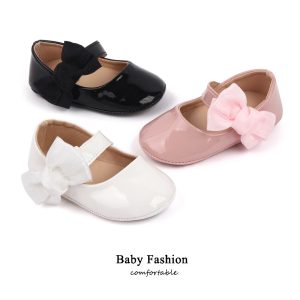 Elegant baby girls' shoes in black, pink, and white with satin bows, perfect for special occasions and comfort, available at Syndmart online store.