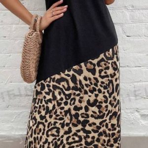 A black and leopard print maxi dress featuring a short-sleeve top and a patterned skirt.