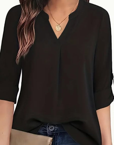 Chic V-Neck Blouse: Relaxed Fit, Long Sleeve Fashion for Women 2 Black V-Neck Blouse With Roll-Up Sleeves Worn By A Model, Featuring A Simple Design.