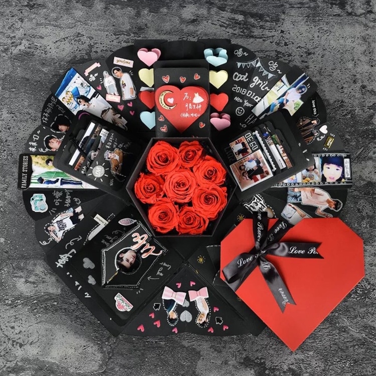 Surprise Explosion Heart-Shaped DIY Handmade Photo Album & Gift Box 1 Heart-Shaped Gift Box Containing Red Roses And Decorative Cards Arranged Around It.