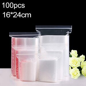 Vacuum storage bags for food and clothes, 16x24cm, pack of 100, transparent resealable ziplock bags for organization and preservation, ideal for travel and storage needs, displayed with white roses.