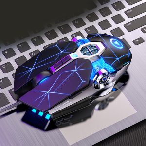 High-tech gaming mouse with neon blue accents and geometric patterns resting on a laptop keyboard for cybernetic and gaming accessories SEO.