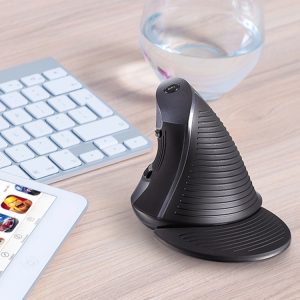 Portable handheld barcode scanner with ergonomic design on desk for retail inventory management.