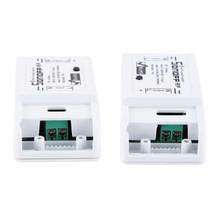 Smart Sonoff Wireless Switch: WiFi Timer & Remote Control 5 Two Sonoff Smart Switch Modules With Input And Output Terminals Visible On The Front.