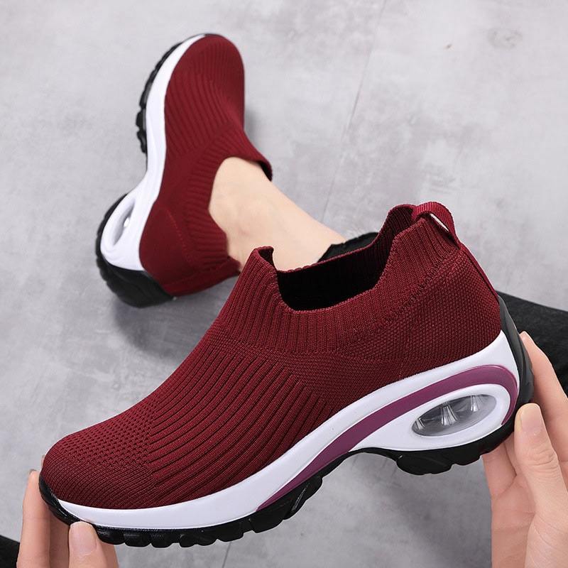 Ultimate Breathable Sneakers: Summer Air Cushion Technology, Ideal for Active Runners 2 Comfortable Red Slip-On Athletic Sneakers With Breathable Knit Fabric, Cushioned Sole, And Air Cushion In Heel For Shock Absorption, Perfect For Running And Casual Wear.