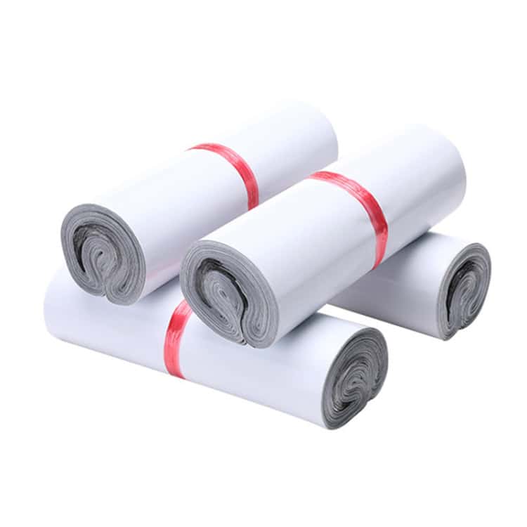 Air Cushion Packaging Bags 14x22cm (100pcs) - Protective Mailing Solution 10 White Rolled Plastic Trash Bags With Red Ties For Waste Disposal And Recycling.