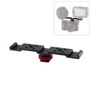 Camera mounting plate with adjustable base and multiple mounting holes for accessories.