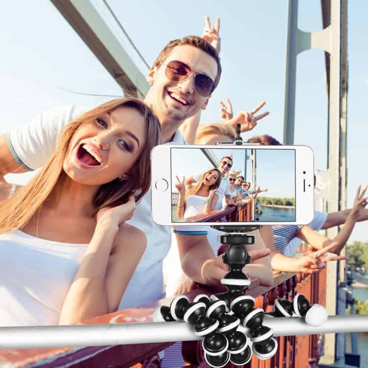 Flexible Grip Camera Tripod - Ideal for Mini Digital Cameras - Black 8 Vibrant Group Selfie On Bridge With Friends, Using Smartphone Tripod For Perfect Shot, Showcasing Outdoor Fun And Social Bonding.