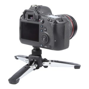 Professional digital camera on tripod, ideal for high-quality photography and videography, showcasing advanced features for content creators.