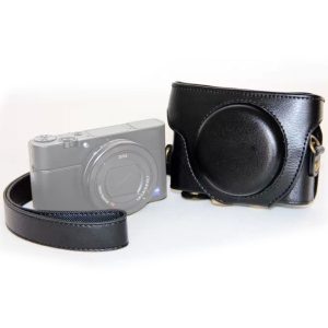 Camera with black leather protective case, portable digital camera accessories, compact camera gear for photography enthusiasts.