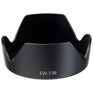 Clear lens hood for camera lens, model EW-73B, compatible with various DSLR lenses, prevents stray light, enhances image quality, and protects the lens from glare and scratches.