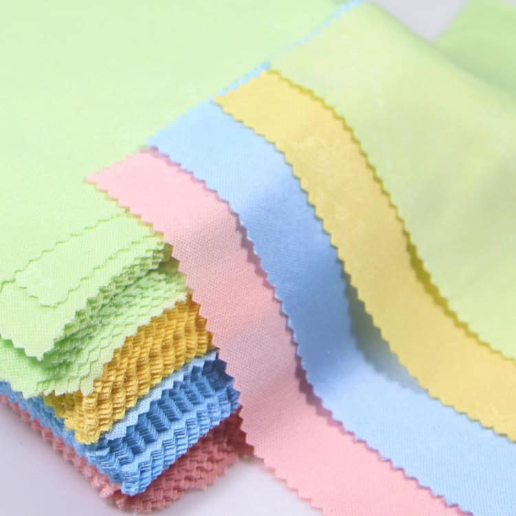 70-Piece Soft Cleaning Cloth Set for LCD, Glasses, Mobile Screens 3 Colorful Fabric Swatches In Pastel Shades Including Pink, Blue, Yellow, And Green, Showcasing High-Quality Textile Samples For Sewing, Fashion Design, And Crafting Projects.