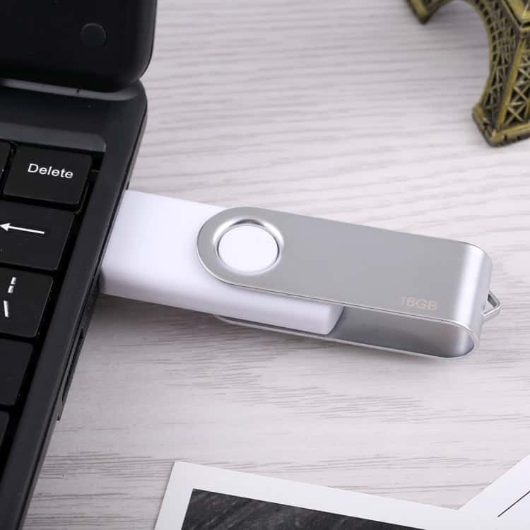 16GB White Twister USB 2.0 Flash Drive - High-Speed Data Storage 10 Usb Flash Drive Plugged Into Laptop For Data Storage And Transfer.