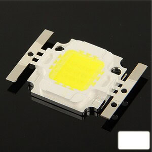 High-power LED chip mounted on heat sink, energy-efficient lighting component.