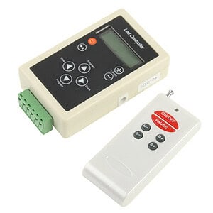 A programmable remote control device with LCD display and buttons, used for controlling industrial equipment and automation systems.