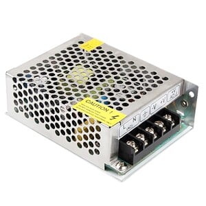 Power supply unit with perforated metal casing for efficient cooling, suitable for electronic projects and industrial applications.