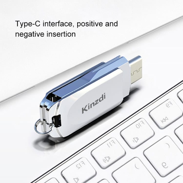 Kinzdi 32GB USB + Type-C Metal Twister Flash Disk V8 - High-Speed Storage Solution 5 Usb Flash Drive With Kinzi Branding Placed On A Keyboard, Showcasing Data Transfer, Storage Solutions, And Technology Accessories For Office And Personal Use.