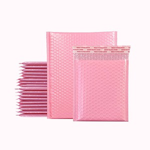 Pink bubble mailers and padded envelopes for secure packaging and shipping. Perfect for protecting fragile items during transit, available in multiple sizes for e-commerce and business needs.