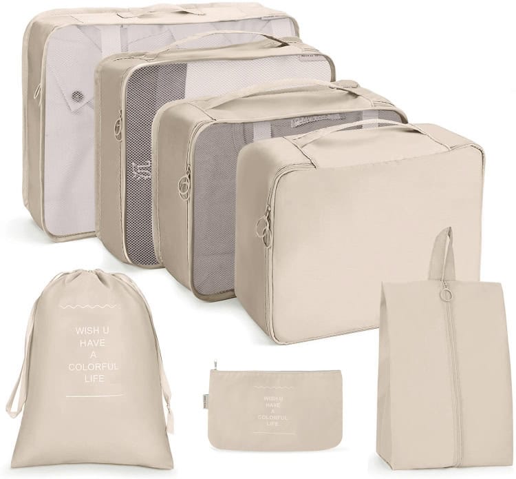 Travel Storage Bag Set - Pack Efficiently with Folding Storage Bags 1 Light Beige Travel Luggage Set With Multiple Compartments And Packing Cubes, Ideal For Organized Packing And Travel Convenience.