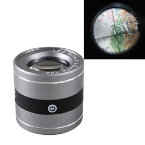 LED magnifying loupe with a silver body and a viewing lens showing a detailed image through the lens.