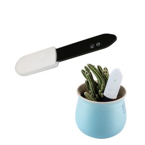 Wireless UV sterilizer device for home and office cleaning, shown with succulent plant in ceramic pot. Compact and portable germ-killing gadget ideal for personal hygiene and tech sanitization.
