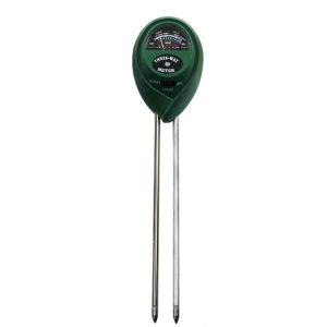 A green three-way moisture meter with metal probes for soil testing, used in agriculture and gardening to measure soil moisture levels.