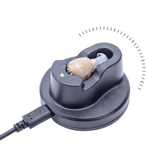 Wireless hearing aid charging station with rechargeable battery for hearing aid devices. Compact design with USB connection for easy charging and improved hearing experience.