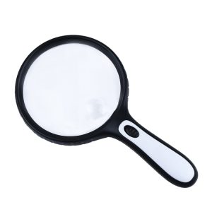 Handheld magnifying glass with a black and white handle and a clear lens.