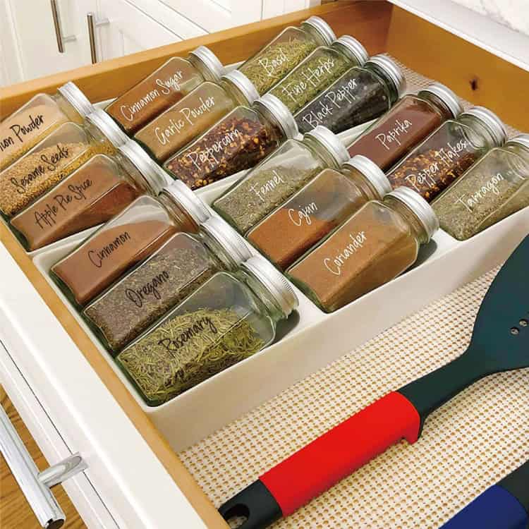 276-Piece Clear Waterproof Spice Labels Combo Pack - Organize Your Pantry! 5 Glass Spice Jars With Labeled Spices In A Wooden Drawer, Organized For Easy Access. Ideal For Kitchen Spice Storage, Featuring A Variety Of Herbs And Seasonings Like Cinnamon, Turmeric, And Garlic Powder.