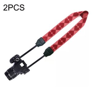 Red heart-pattern camera neck strap for DSLR cameras, adjustable and comfortable, ideal for photography enthusiasts and professionals. Perfect accessory for secure camera carry.