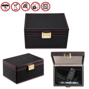 Luxury black carbon fiber jewelry or watch storage box with gold clasp, stylish and secure for organizing valuables, ideal for home or travel.
