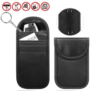 Wireless key fob holder with secure zippered pouch and keychain, RFID blocking protection, durable nylon material, compact design for everyday use.