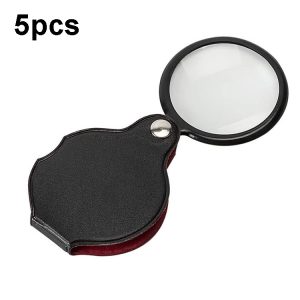 Magnifying glass with a round lens and a black leather case, displayed in an open position.